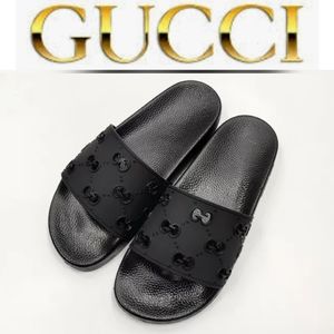 Gucci slippers.